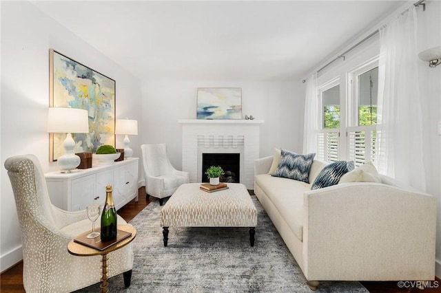 4500 Forest Hill Ave, Richmond, VA 23225 - living room with wood finished floors and a brick fireplace
