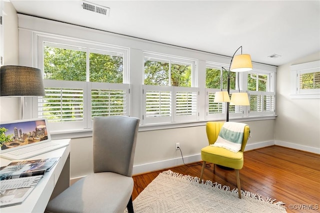 4500 Forest Hill Ave, Richmond, VA 23225 - home office featuring baseboards and wood finished floors