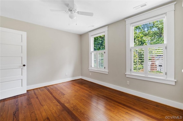 4500 Forest Hill Ave, Richmond, VA 23225 - unfurnished room with baseboards, plenty of natural light, and wood finished floors