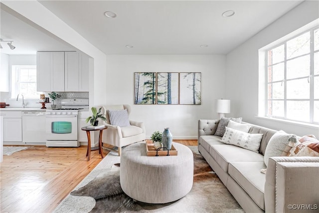 6904 Three Chopt Rd, Richmond, VA 23226 - living room featuring light wood-style floors and recessed lighting