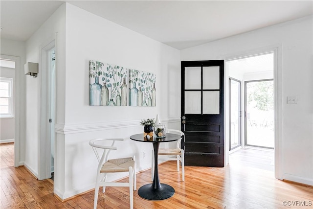6904 Three Chopt Rd, Richmond, VA 23226 - dining area with light wood-style floors and baseboards