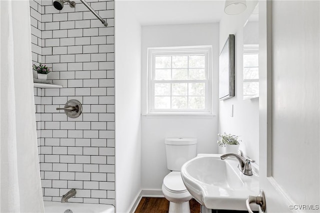6904 Three Chopt Rd, Richmond, VA 23226 - full bath with a sink, tiled shower, toilet, wood finished floors, and baseboards