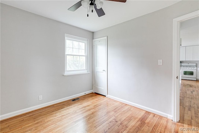 6904 Three Chopt Rd, Richmond, VA 23226 - spare room with a ceiling fan, light wood-type flooring, and baseboards