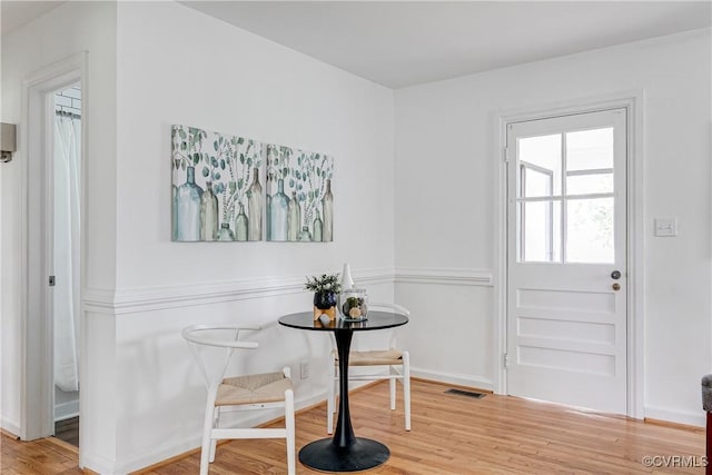 6904 Three Chopt Rd, Richmond, VA 23226 - dining room with light wood-type flooring and baseboards