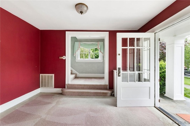 1601 Princeton Rd, Richmond, VA 23227 - carpeted entrance foyer with stairway and baseboards
