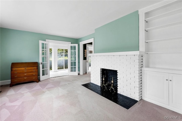 1601 Princeton Rd, Richmond, VA 23227 - unfurnished living room featuring carpet floors, a fireplace, and baseboards