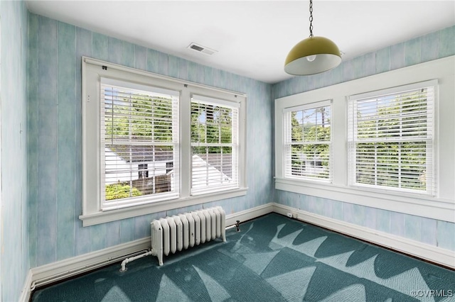 1601 Princeton Rd, Richmond, VA 23227 - unfurnished room featuring radiator, dark carpet, healthy amount of natural light, and baseboards