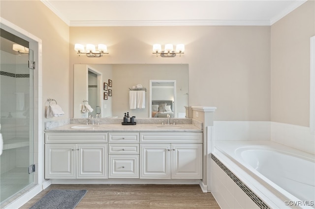 3806 Wild Goose Walk, Henrico, VA 23060 - full bath featuring a shower stall, double vanity, a garden tub, crown molding, and wood finished floors