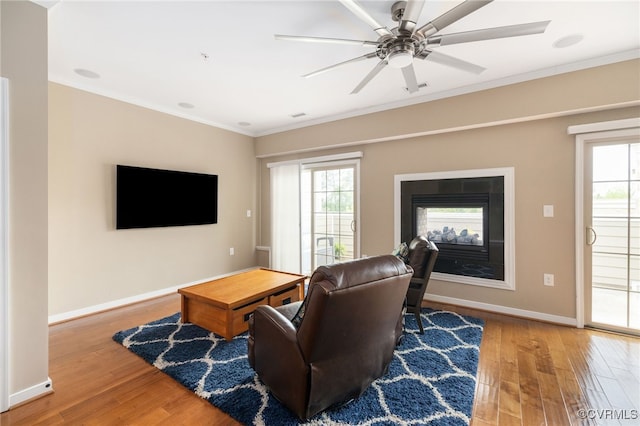 3806 Wild Goose Walk, Henrico, VA 23060 - living area featuring ornamental molding, wood finished floors, baseboards, and plenty of natural light
