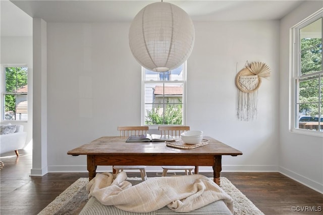 122 Elm St, Petersburg, VA 23803 - dining room with plenty of natural light, baseboards, and wood finished floors
