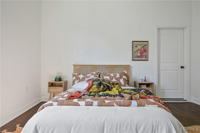 122 Elm St, Petersburg, VA 23803 - bedroom with dark wood-style flooring and baseboards