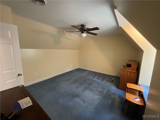 2458 Happy Hill Ln, Mechanicsville, VA 23111 - bonus room featuring a ceiling fan, lofted ceiling, dark colored carpet, and baseboards