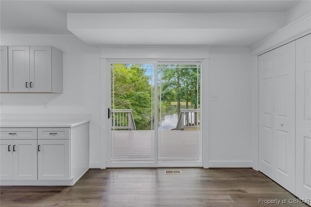 647 Lakeview Dr, Heathsville, VA 22473 - doorway to outside with wood finished floors and baseboards