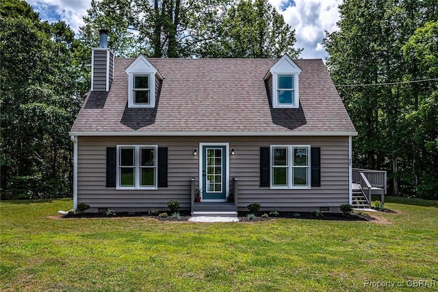 647 Lakeview Dr, Heathsville, VA 22473 - cape cod-style house with a front yard, a chimney, and a wooden deck