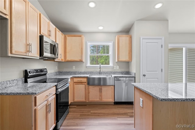 TBD Vista Lane, Mineral, VA 23117 - kitchen featuring stainless steel appliances, a sink, light brown cabinets, light wood-type flooring, and light stone counters