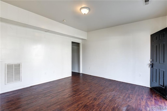 716-718 Wesley St, Petersburg, VA 23803 - empty room featuring dark wood-type flooring and baseboards