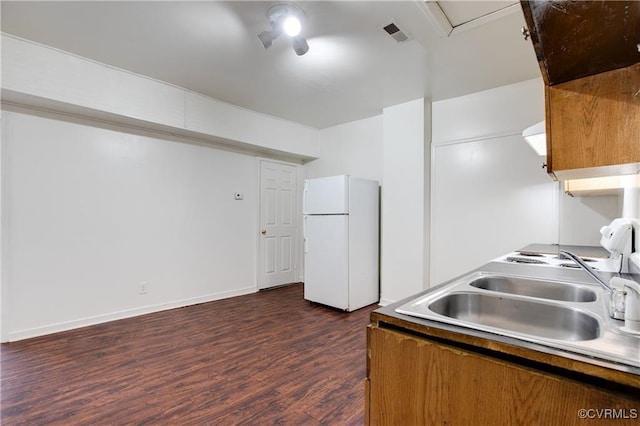 716-718 Wesley St, Petersburg, VA 23803 - kitchen featuring freestanding refrigerator, a sink, and dark wood-type flooring