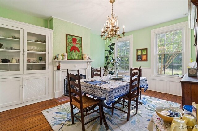 36 Carter Rd, Cumberland, VA 23040 - dining area featuring wood-type flooring, a chandelier, and a wainscoted wall