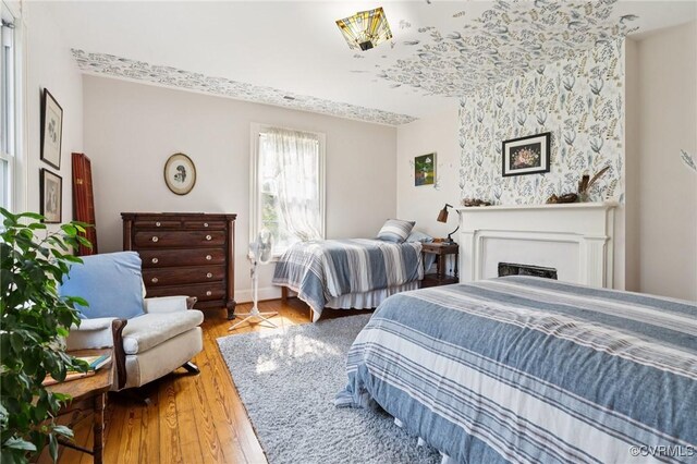 36 Carter Rd, Cumberland, VA 23040 - bedroom with wood finished floors and a fireplace