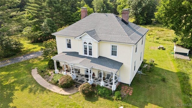 36 Carter Rd, Cumberland, VA 23040 - view of front of home with a chimney, a front lawn, french doors, and a patio area