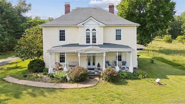 36 Carter Rd, Cumberland, VA 23040 - back of property featuring french doors, a yard, and a chimney