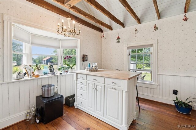 36 Carter Rd, Cumberland, VA 23040 - kitchen with hardwood / wood-style flooring, white cabinets, healthy amount of natural light, a chandelier, and wallpapered walls