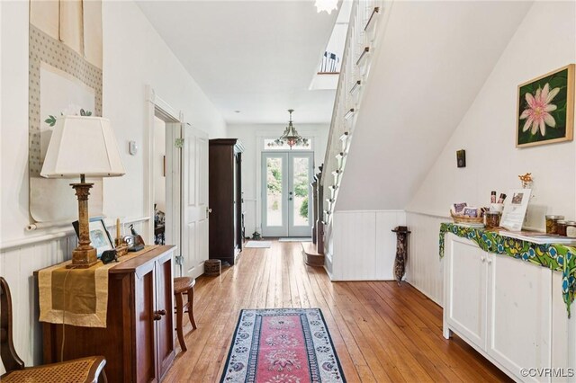 36 Carter Rd, Cumberland, VA 23040 - foyer featuring wainscoting, light wood-style flooring, and french doors