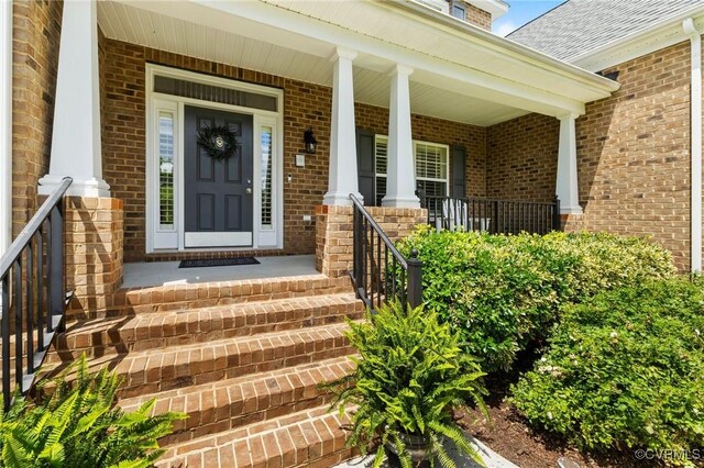 4030 Water Overlook Blvd, Midlothian, VA 23112 - entrance to property featuring covered porch and brick siding