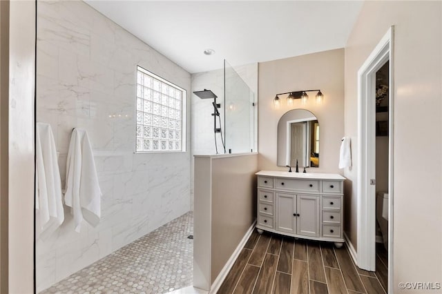 4030 Water Overlook Blvd, Midlothian, VA 23112 - bathroom featuring walk in shower, vanity, wood finished floors, and baseboards