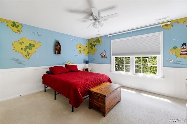 4030 Water Overlook Blvd, Midlothian, VA 23112 - bedroom with wainscoting, carpet, ceiling fan, and wooden walls