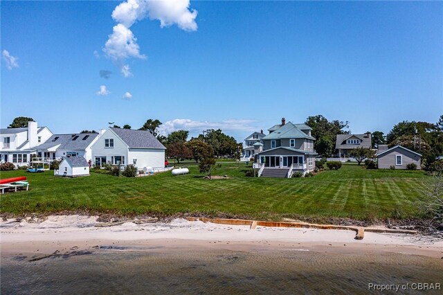 159 Fleeton Point Cir, Reedville, VA 22539 - view of front of property with view of water and beach and a front yard