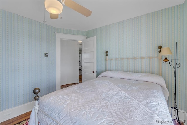 159 Fleeton Point Cir, Reedville, VA 22539 - bedroom featuring wood finished floors and a ceiling fan