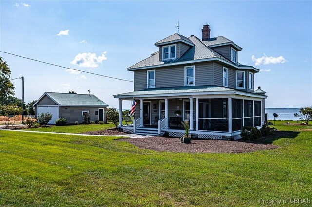 159 Fleeton Point Cir, Reedville, VA 22539 - view of front of house with a front yard, a porch, and a chimney