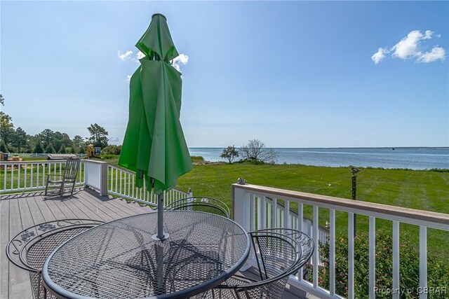 159 Fleeton Point Cir, Reedville, VA 22539 - wooden deck with outdoor dining area, a water view, and a lawn