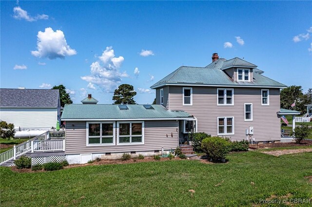 159 Fleeton Point Cir, Reedville, VA 22539 - back of house with a yard, a chimney, and crawl space
