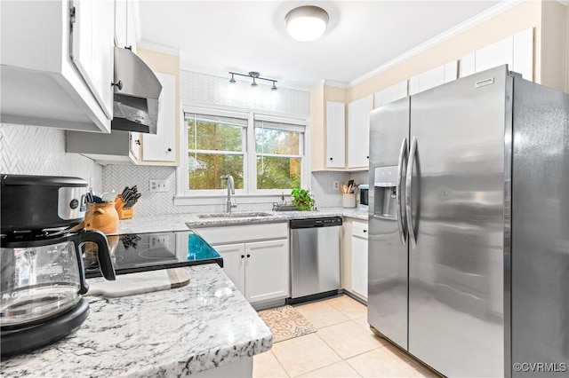 13710 Arrowood Ct, Midlothian, VA 23112 - kitchen featuring stainless steel appliances, a sink, wall chimney range hood, tasteful backsplash, and light tile patterned floors