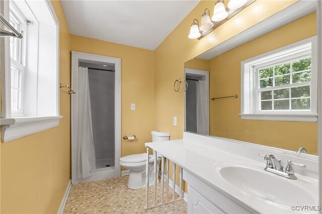 11911 Kilrenny Rd, Midlothian, VA 23113 - full bath with toilet, a shower stall, vanity, and baseboards