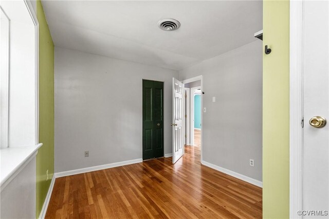 11911 Kilrenny Rd, Midlothian, VA 23113 - empty room with wood finished floors and baseboards