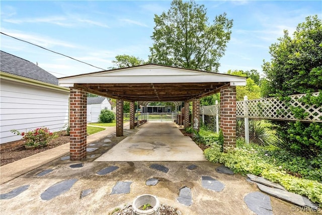 3513 Patrick Ave, Richmond, VA 23222 - view of parking with a carport and concrete driveway
