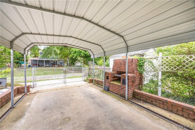 3513 Patrick Ave, Richmond, VA 23222 - view of parking / parking lot with a gate and a carport