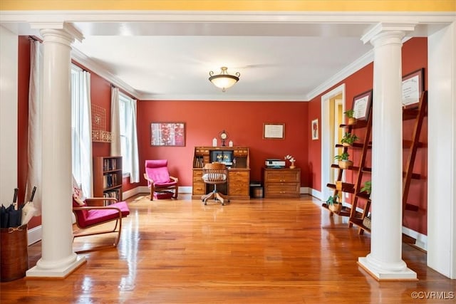 11470 Jack Ln, Hanover, VA 23146 - sitting room with decorative columns, light wood-type flooring, crown molding, and baseboards