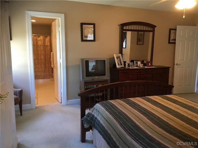 2401 Bell Tower Pl, Henrico, VA 23233 - bedroom with light carpet, baseboards, connected bathroom, and a ceiling fan