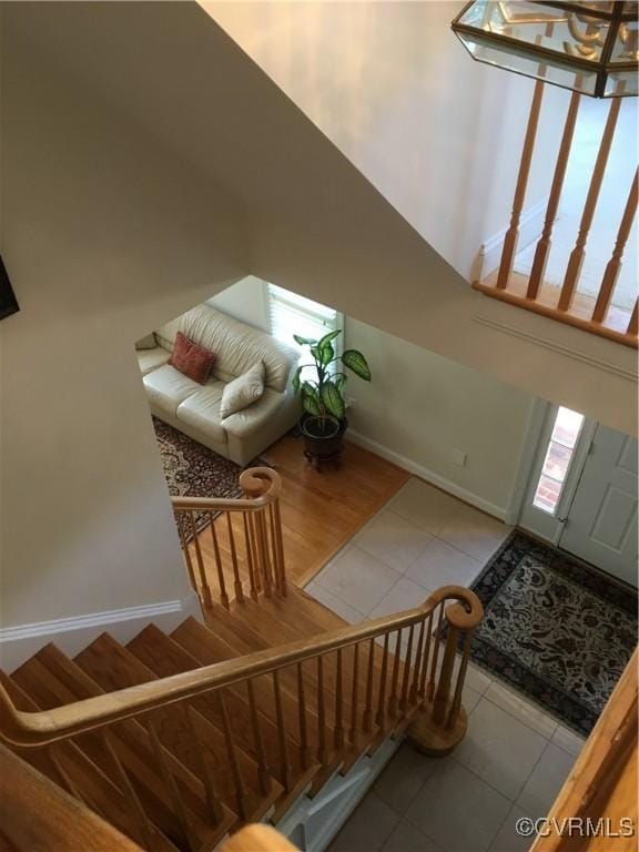 2401 Bell Tower Pl, Henrico, VA 23233 - foyer with tile patterned floors, stairs, and baseboards