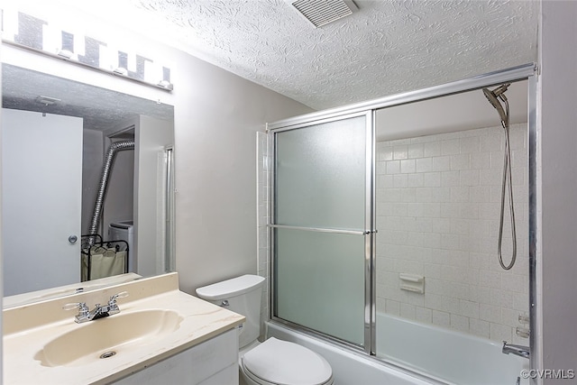 1500 Largo Rd Unit 201, Henrico, VA 23238 - bathroom with a textured ceiling, vanity, toilet, and shower / bath combination with glass door