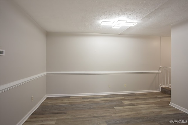 1500 Largo Rd Unit 201, Henrico, VA 23238 - empty room with wood finished floors, a textured ceiling, and baseboards