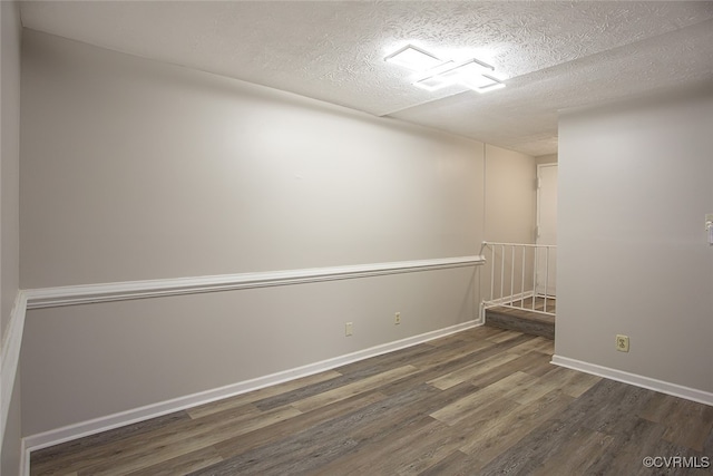 1500 Largo Rd Unit 201, Henrico, VA 23238 - empty room featuring wood finished floors, a textured ceiling, and baseboards