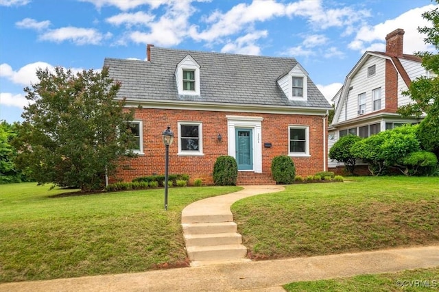 3204 Griffin Ave, Richmond, VA 23222 - cape cod-style house featuring brick siding and a front lawn
