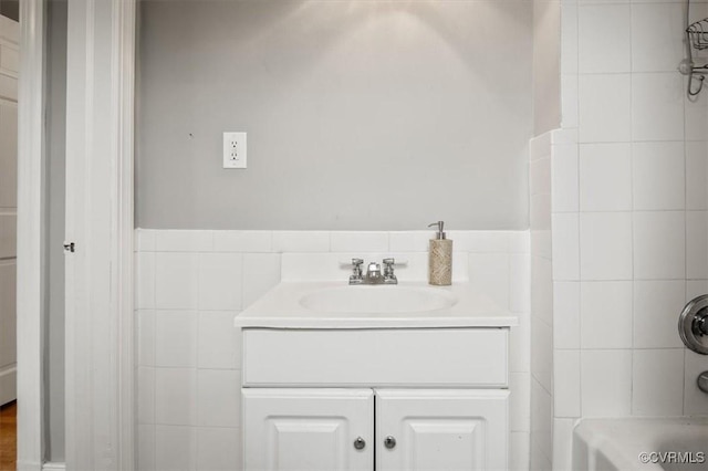 3204 Griffin Ave, Richmond, VA 23222 - full bath with vanity, tile walls, and washtub / shower combination