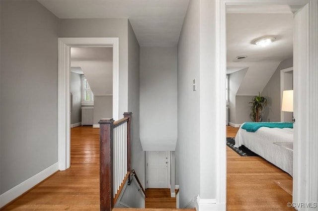 3204 Griffin Ave, Richmond, VA 23222 - hall with an upstairs landing, wood finished floors, baseboards, and vaulted ceiling