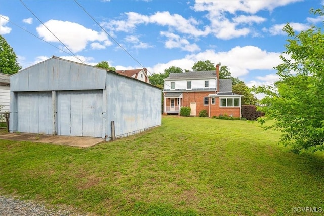 3204 Griffin Ave, Richmond, VA 23222 - view of green lawn with an outdoor structure and an outbuilding